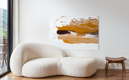 Abstract painting on canvas in shades of beige, gold, and dark brown