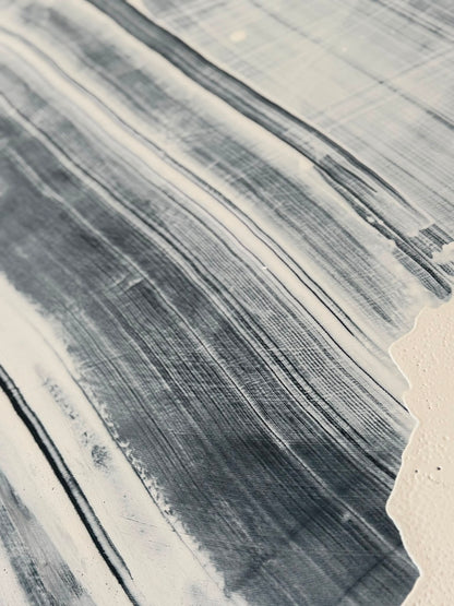 Abstract painting on canvas in shades of black and white
