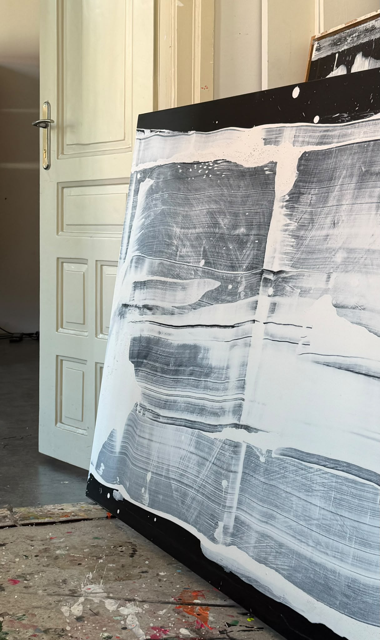 Abstract painting on canvas in shades of black and white