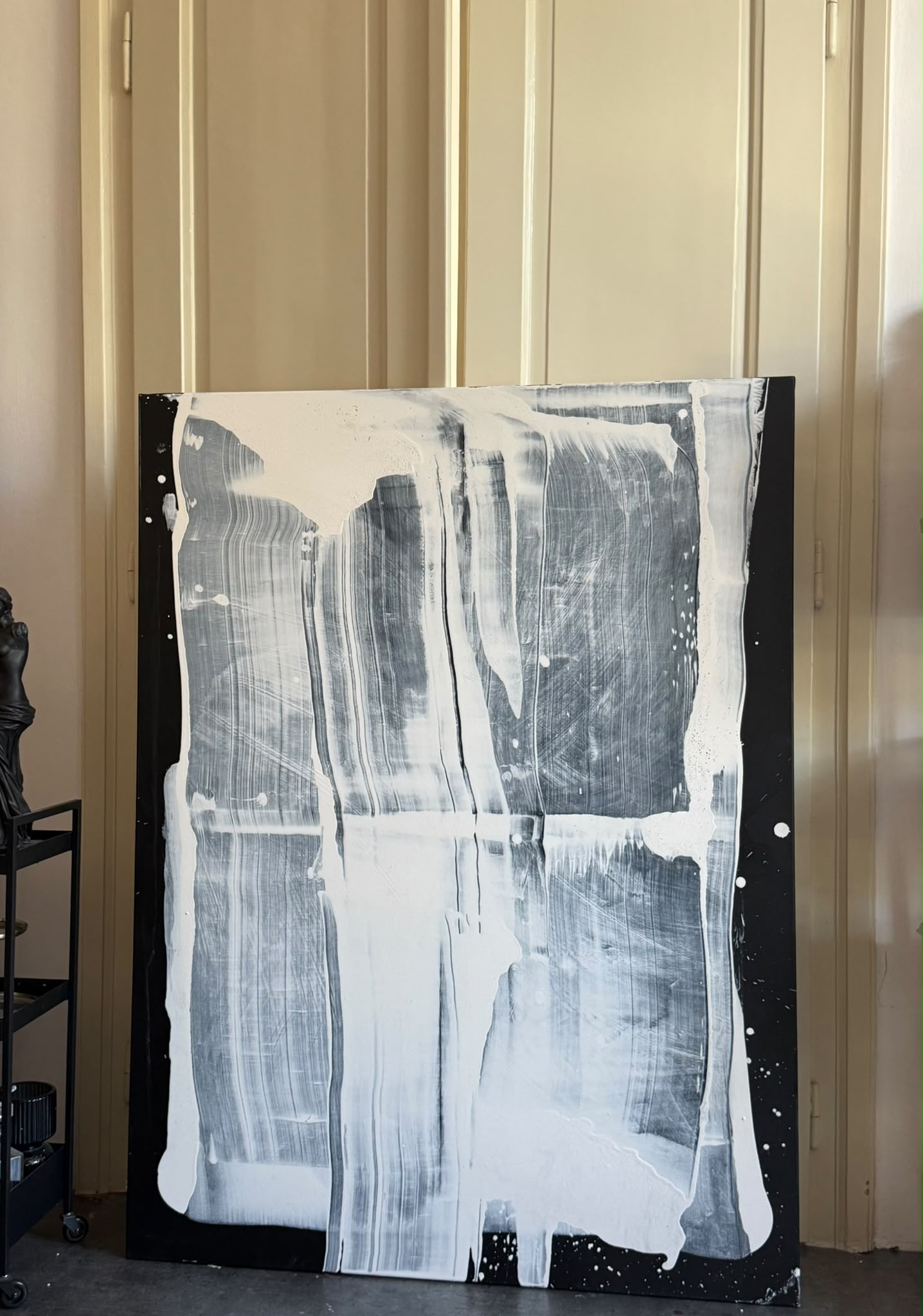 Abstract painting on canvas in shades of black and white
