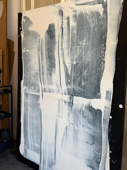 Abstract painting on canvas in shades of black and white