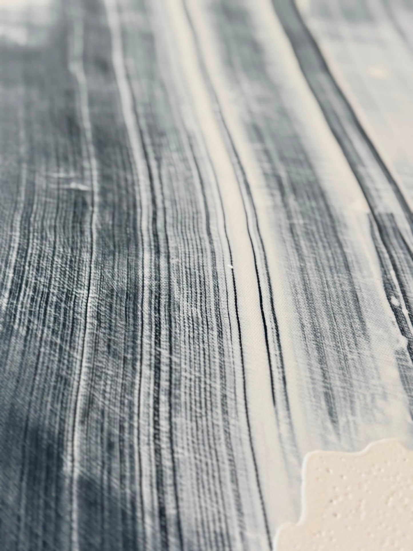 Abstract painting on canvas in shades of black and white