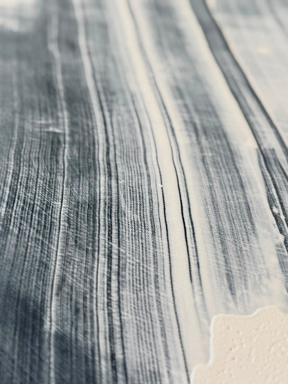 Abstract painting on canvas in shades of black and white